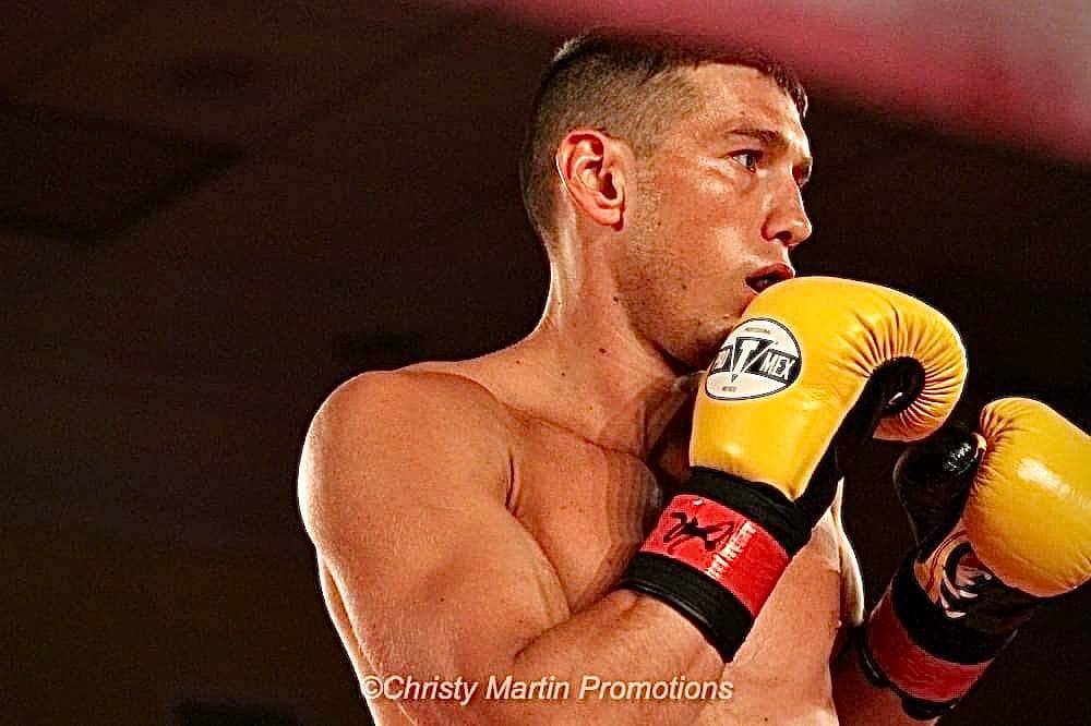 Professional boxer Artem Brusov in fighting stance — BRUS Boxing coach in Hallandale Beach