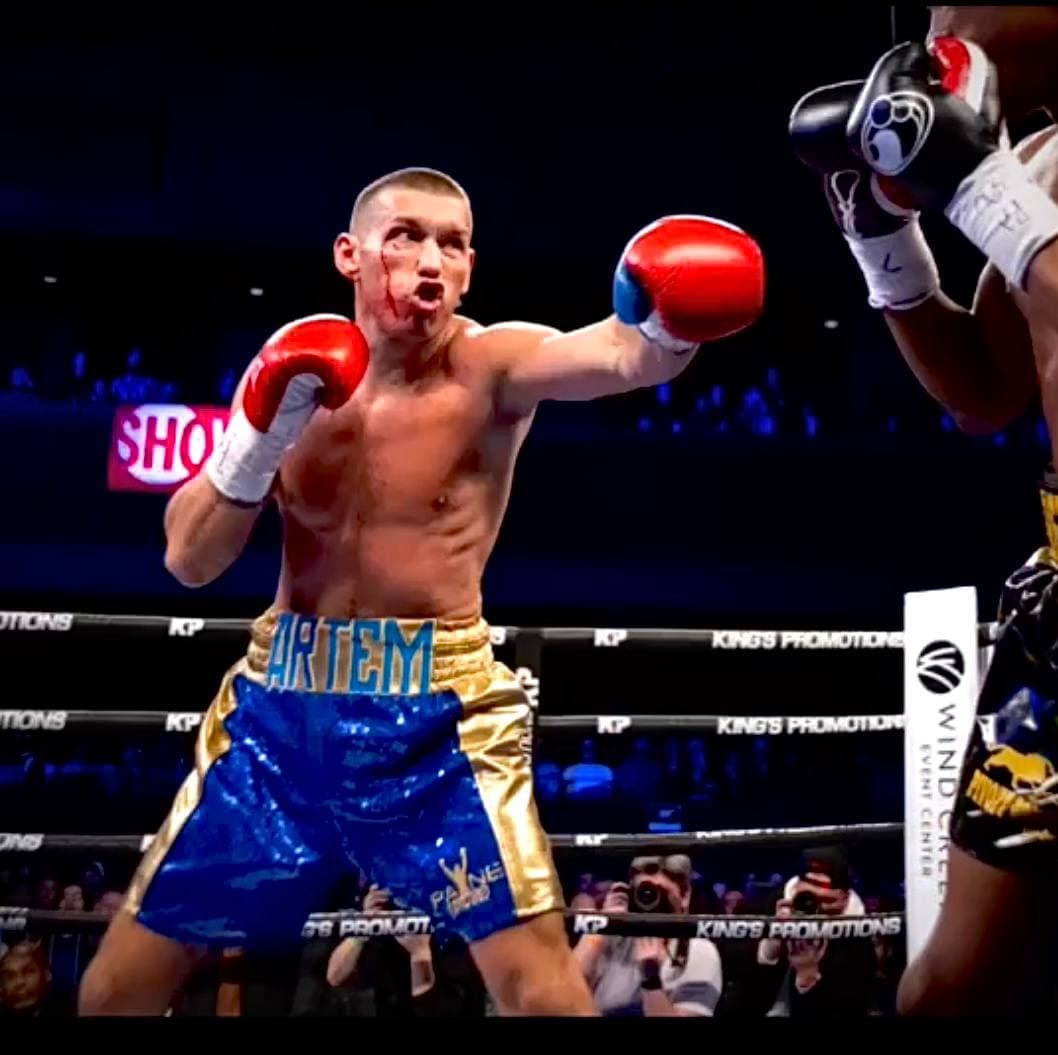 Artem Brusov mid-fight on Showtime ShoBox — Hallandale Beach boxing coach