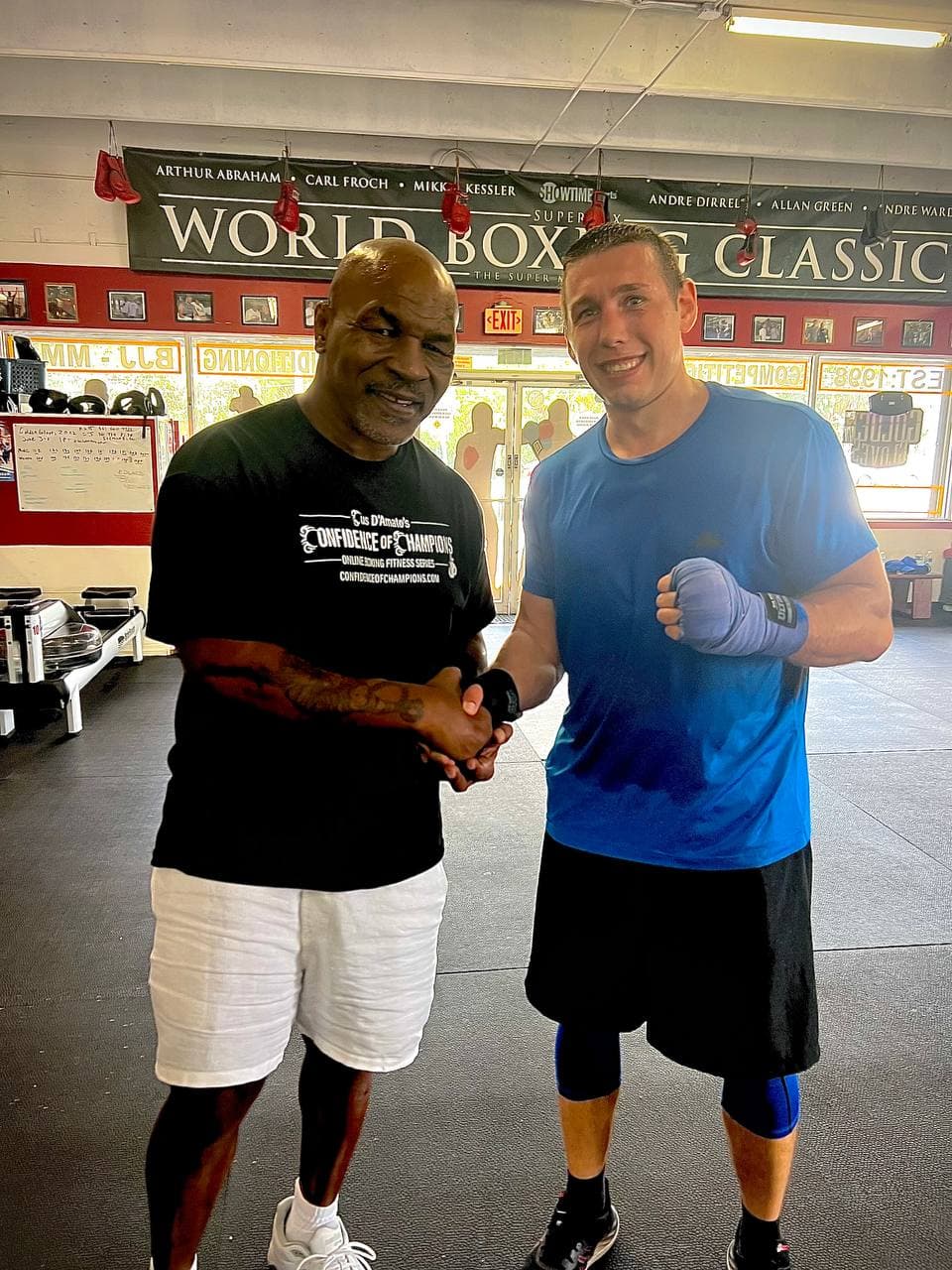 Artem Brusov with heavyweight legend Mike Tyson at World Boxing Classics